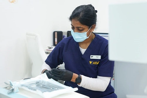 Nurse at AEMC, providing compassionate care and support with advanced technology for a superior dental treatment experience
